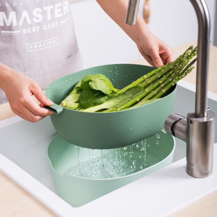 Light green double-dish vegetable drain basket with stacked bowls and side handles