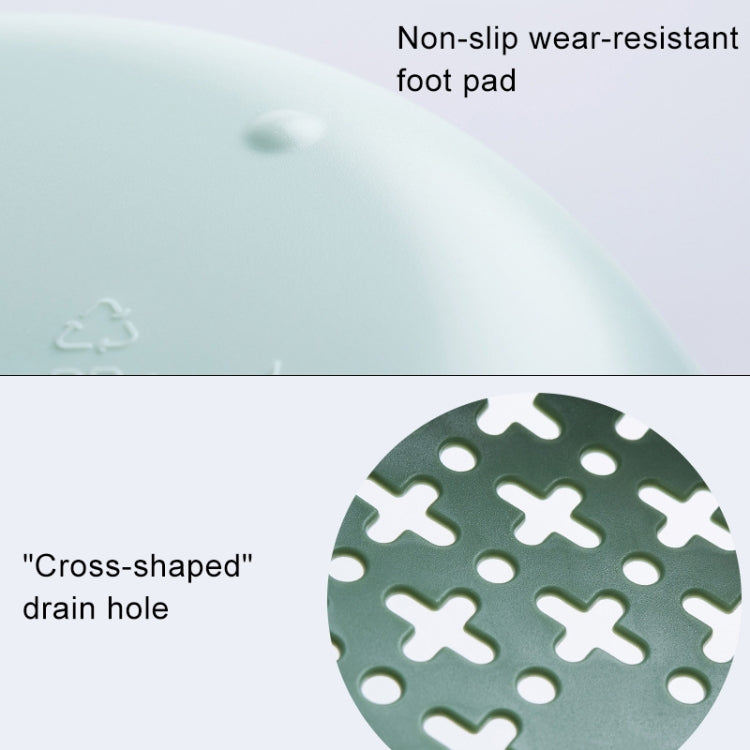 Light green drain basket with non-slip pad and cross-shaped drain holes