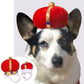 Red plush pet crown hat with gold trim and blue jewel accents on an animal head with ears.