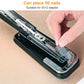 Black portable stapler with visible internal rails and inserted staples