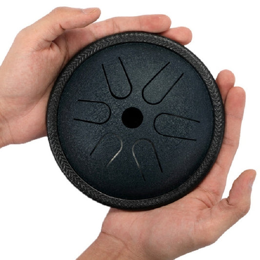 Navy blue pocket drum with round steel body and nine finger-tone slots
