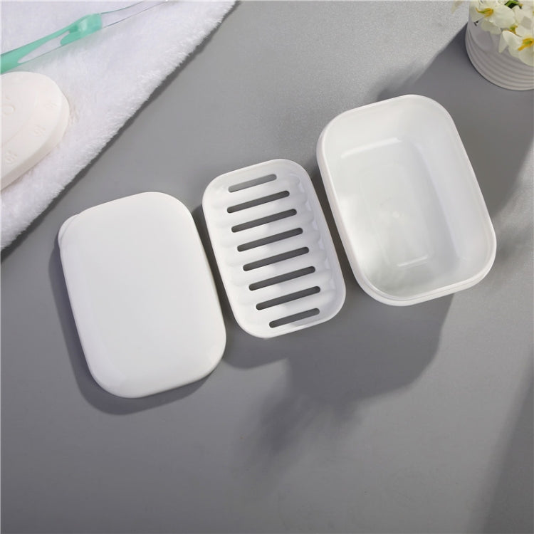 White plastic sealed travel soap holder with vented base