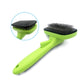 Green grooming comb with black bristles and protective rubber pad head