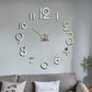 Silver acrylic wall clock with raised 3D numbers and crossed hands