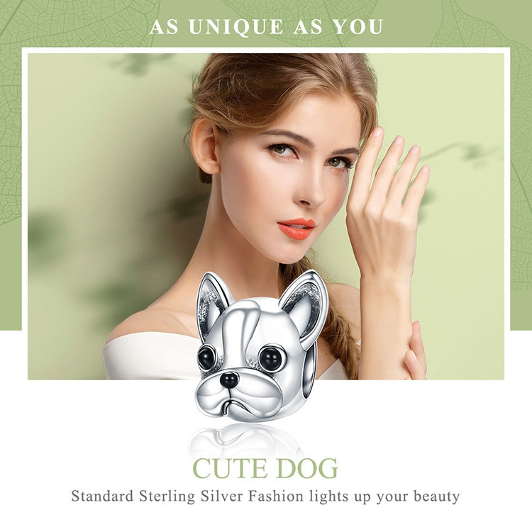 Sterling silver bulldog head bead with raised ears, black eyes, and glossy facial details