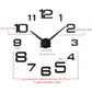 Black digital acrylic wall clock with raised numerals and cross hands at center