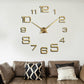 Gold digital acrylic wall clock with raised 12-hour numerals and cross hands