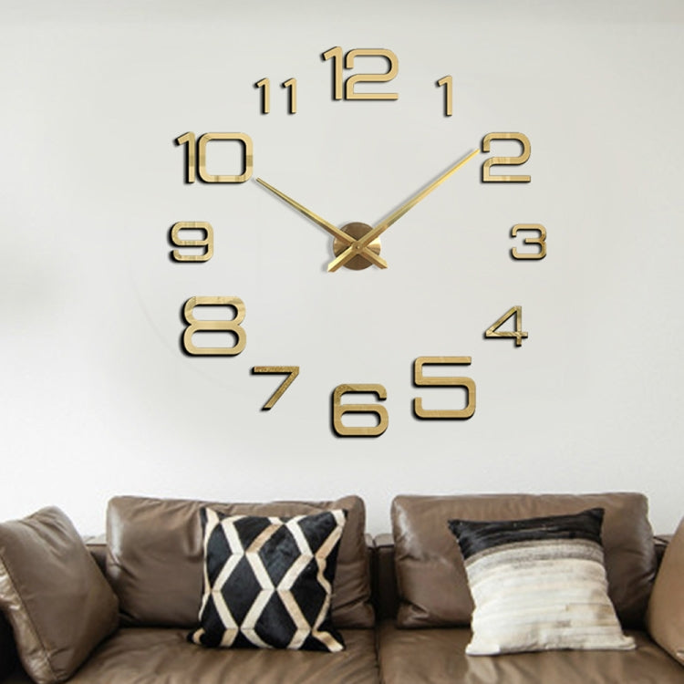 Gold digital acrylic wall clock with raised 12-hour numerals and cross hands