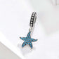 Sterling silver starfish pendant charm with blue stones and pavé bail