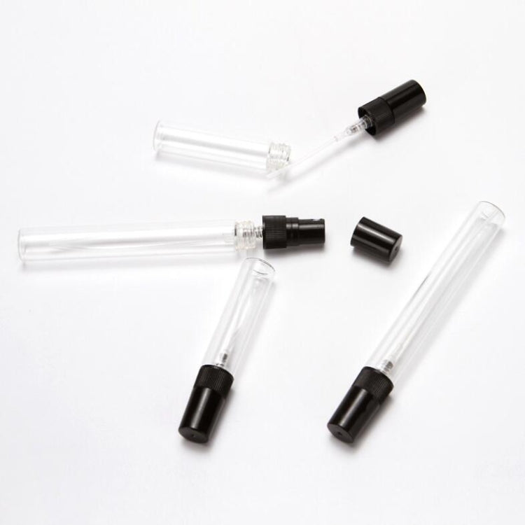 Empty perfume atomizer bottles, clear vials with black spray caps