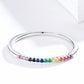 Sterling silver ring with multicolor zircon accents