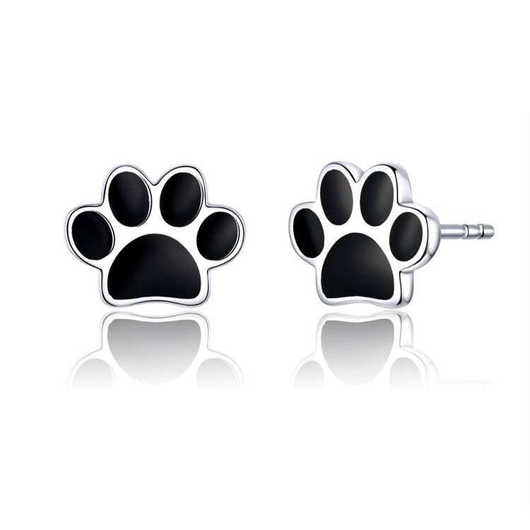 Sterling silver paw print stud earrings with black enamel pads and round center