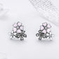 Sterling silver stud earrings shaped like a pink-flower cluster with cubic zirconia
