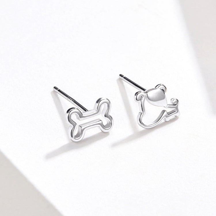 Polished sterling silver dog bone stud earrings with long post backs, side view
