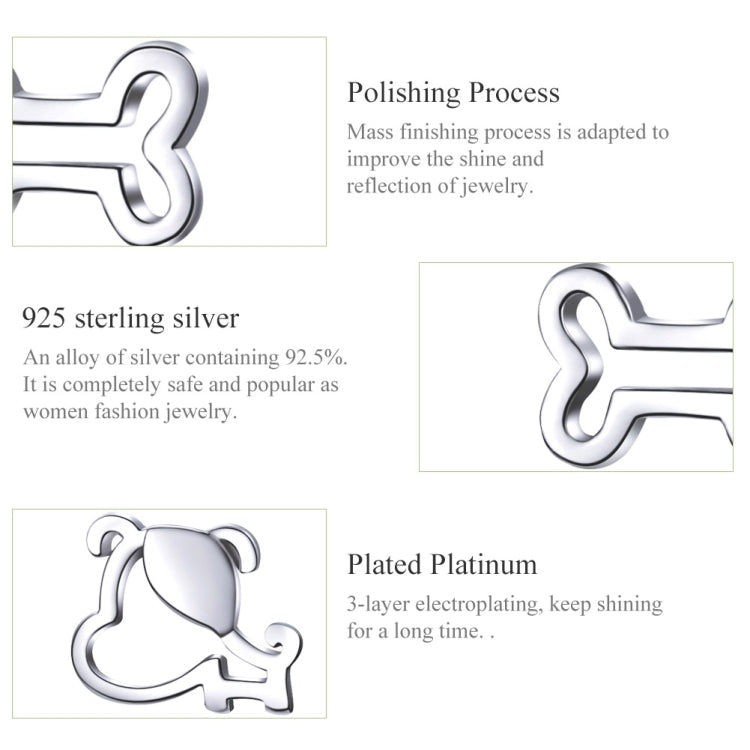 Close-up of hollow dog bone stud earrings in sterling silver, polished finish