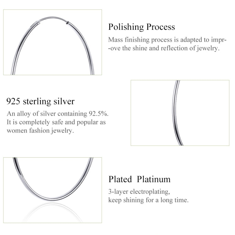 Platinum-plated sterling silver oval hoop earrings, close-up of top section