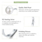 Sterling silver open ring with large round white pearl-style stone, close-up
