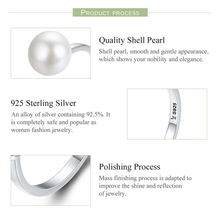 Sterling silver open ring with large round white pearl-style stone, close-up