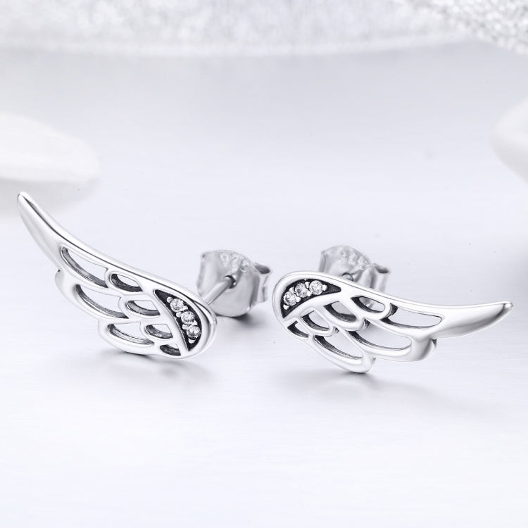 Silver wing stud earrings with CZ sparkle detail, butterfly back view