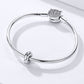 Sterling silver snake chain charm bracelet with pavé bead and spacer