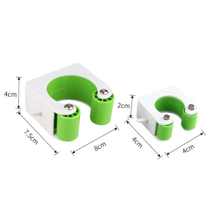 Green bicycle wall-mount parking buckle with size measurements labeled in cm