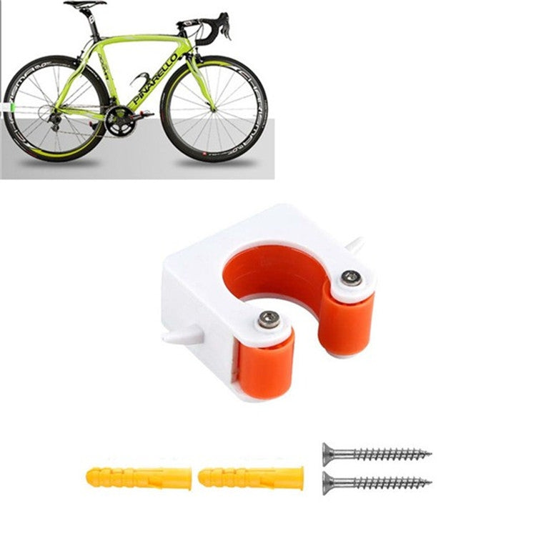 Orange bicycle wall-mount parking buckle with included yellow anchors and screws
