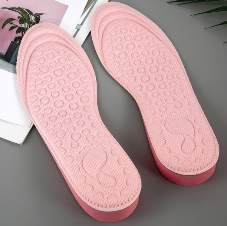 Pair of pink EVA heightening shoe insoles with textured top and cushioned underside.