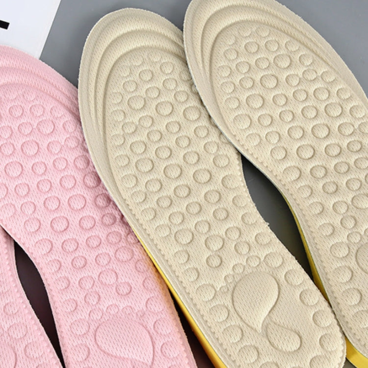 Beige and pink EVA heightening insoles showing textured traction dots on top.