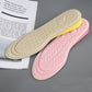 Beige and pink EVA heightening insoles with yellow lift layer and textured footbed.