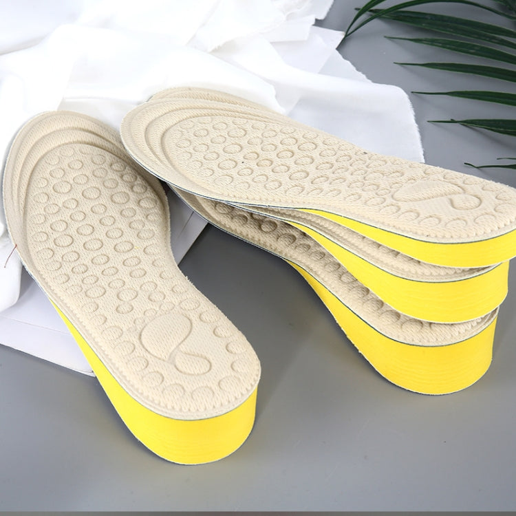 Beige EVA heightening insoles set with yellow lift layer and textured anti-slip top.