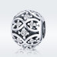 Sterling silver bead with black enamel floral and dotted crystal design