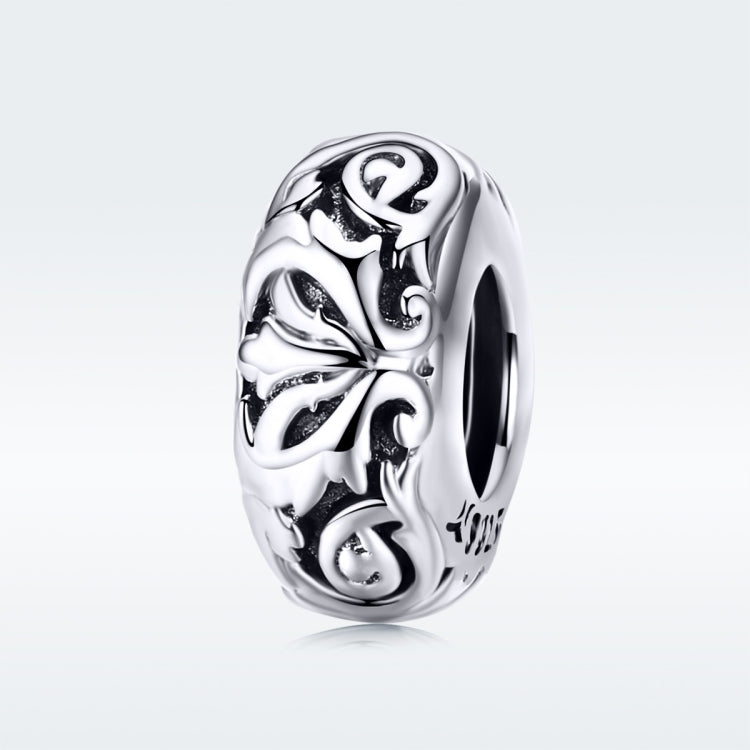 Sterling silver flower-pattern charm bead with oxidized swirls, glossy hollow design