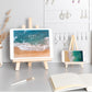 Wood desktop easel stand holding a tablet and a phone side by side