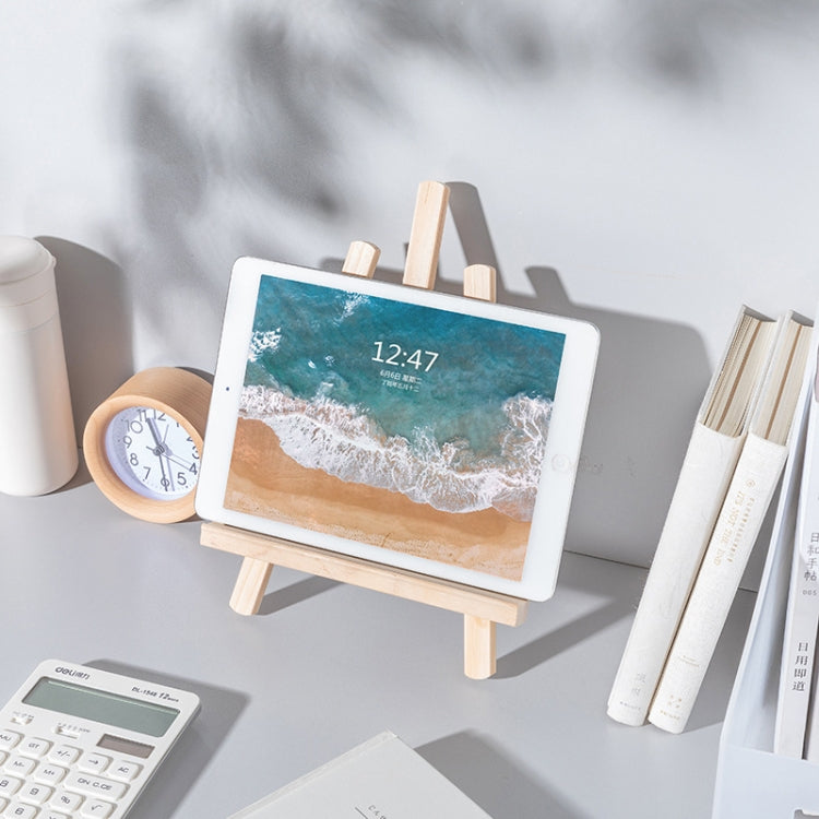 Wooden tabletop easel stand supporting a tablet in landscape orientation