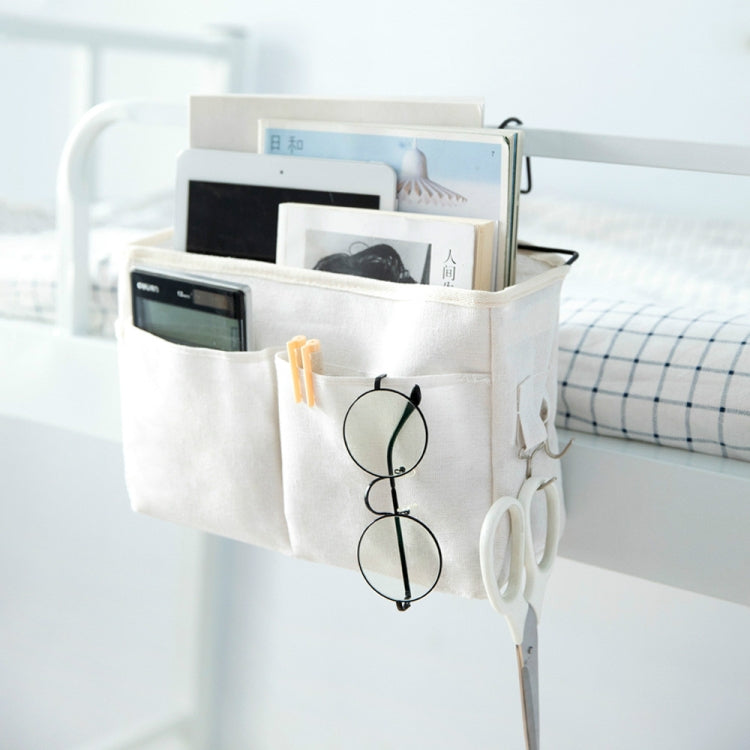 White hanging storage bag with open top, front compartments, and pen pocket
