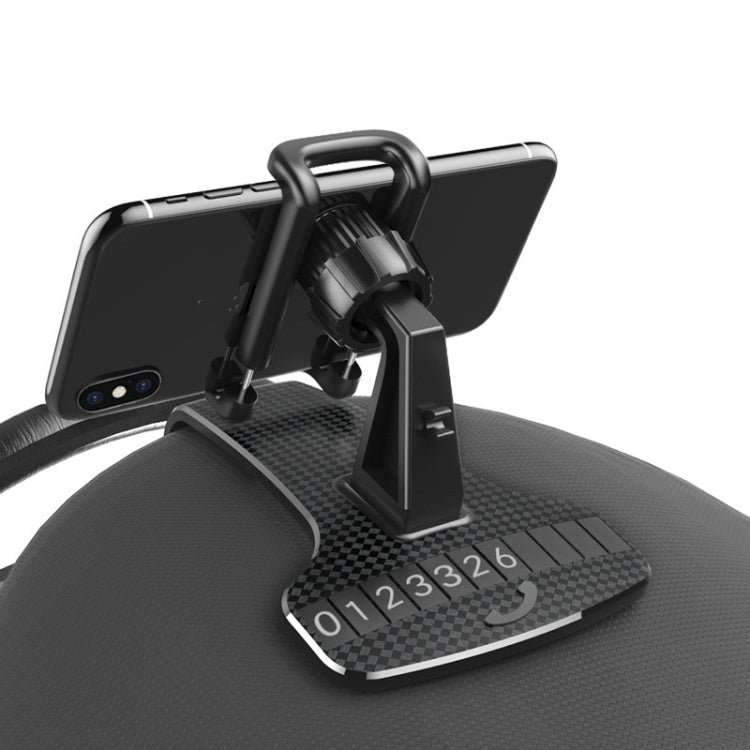 Car phone holder on dashboard with adjustable cradle and temporary number plate strip