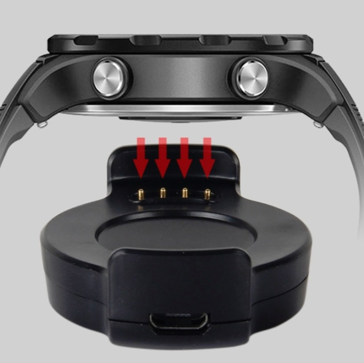 Black magnetic charging base showing charging port and indicator pins
