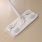 Flat mop base holding a disposable dust removal cloth pad