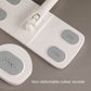 Close-up of flat dust mop head with four gray rubber icons and central clip