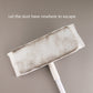 Dust removal mop with used, gray-stained disposable pad attached