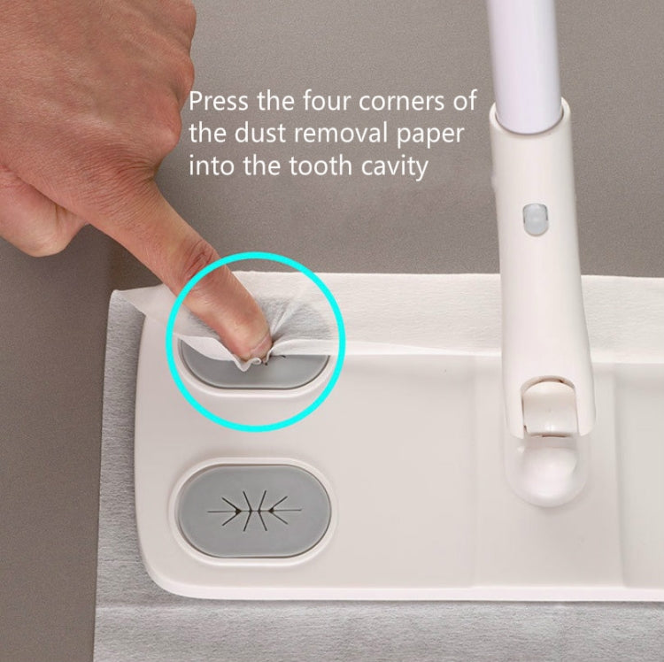 Hand pressing corners of dust removal paper into mop head cavity