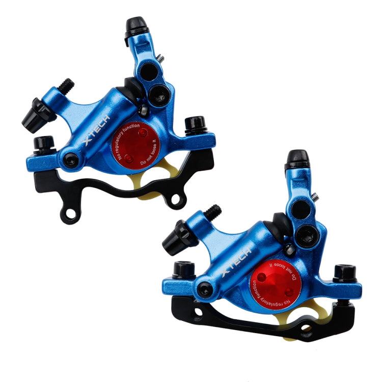 Pair of blue hydraulic disc brake calipers with mounting brackets and hose ports