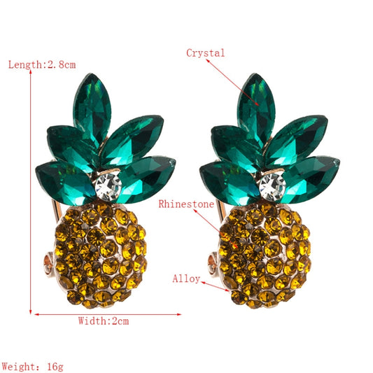 Green leaf and yellow rhinestone pineapple stud earrings, crystal detail close-up