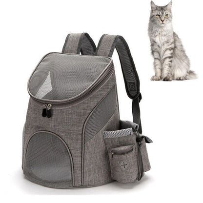 Gray pet carrier backpack with front mesh window, top flap, and side pouch