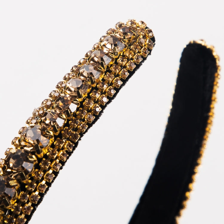 Gold rhinestone headband with small amber faceted stones