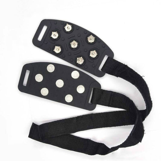 Black snow ice shoe traction covers with studded rubber sole and adjustable straps