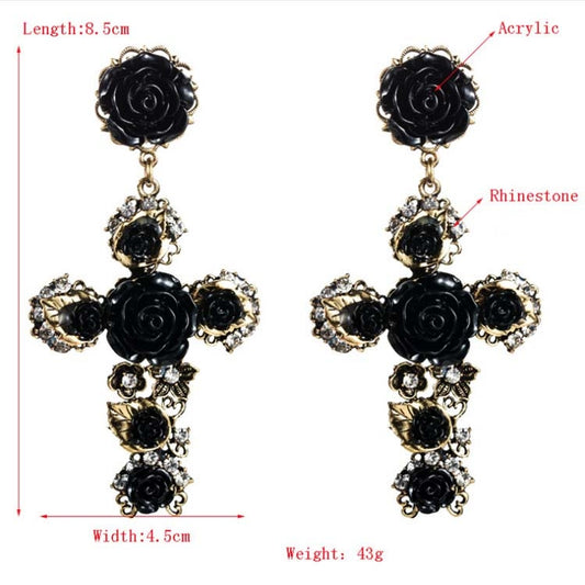 Pair of black rose cross long dangle earrings with rhinestones and gold-tone details