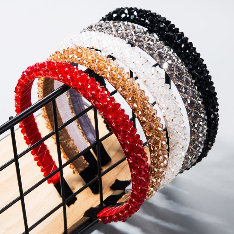 Multicolor crystal beaded fabric headband with black, white, red, and gold sections