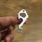 Key ring multi-tool bottle opener and wrench-shaped metal head