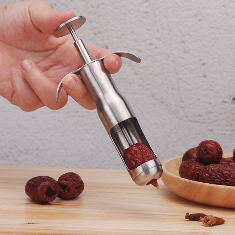 Handheld stainless steel date pitting device with red coring tip